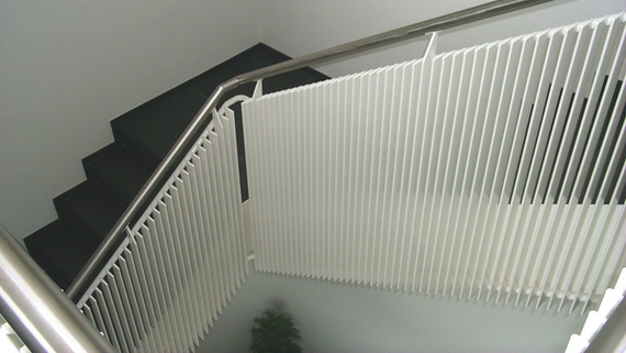 Zehnder Excelsior jako schodišťový radiátor