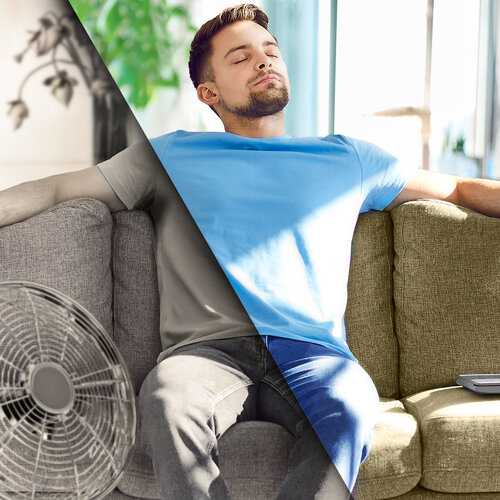 Zehnder_ALL_ExpReno_Overheating_Visual_01_250807_web Young man relaxing on couch enjoying fresh air of comfortable indoor climate